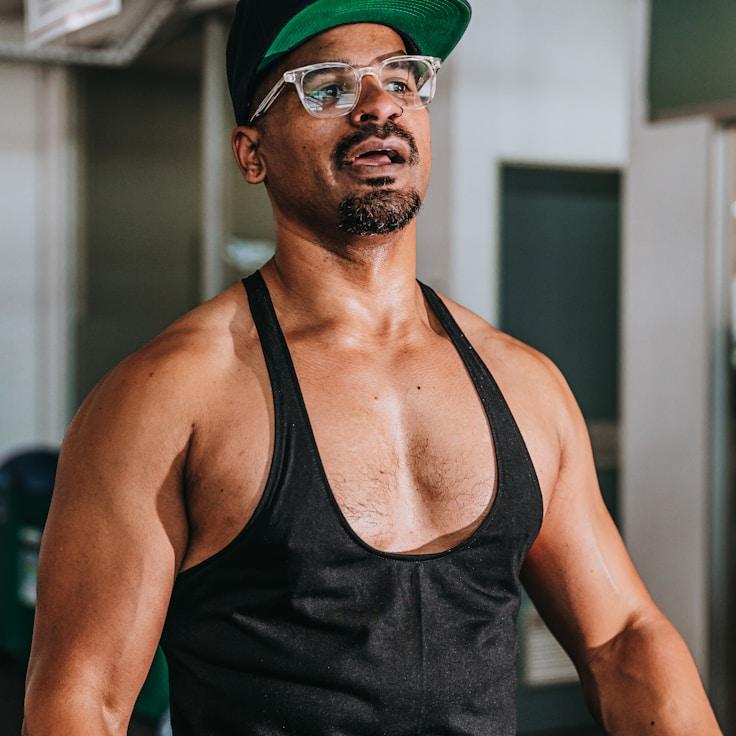 Women in a fitness class doing stretching and mobility exercises